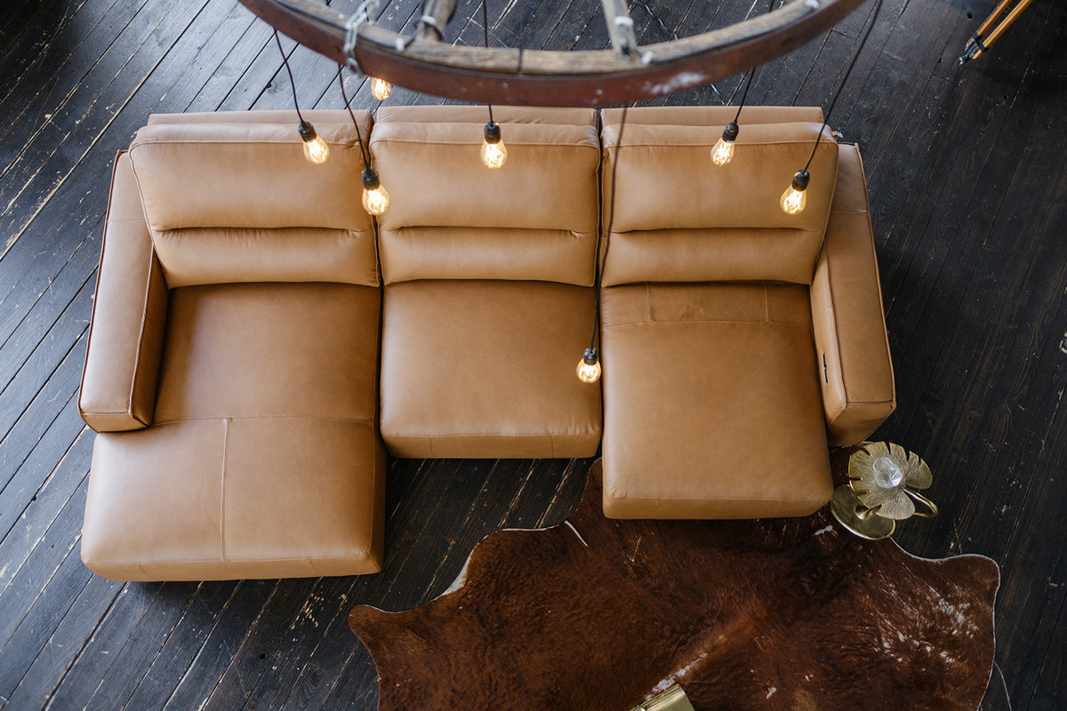 KAWOLA Big Sofa DORI motorischer Sitzvorzug Leder cognac