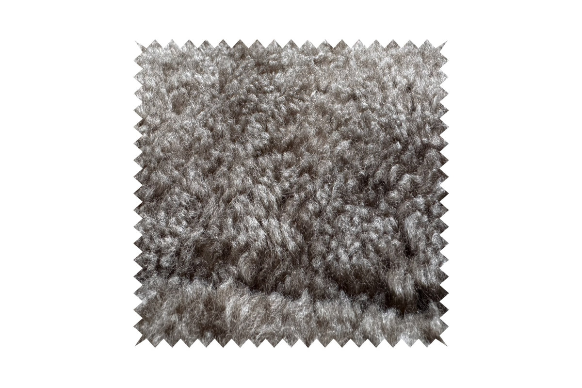 KAWOLA Relaxsessel SILVA Drehsessel Schaffell beige mit Hocker