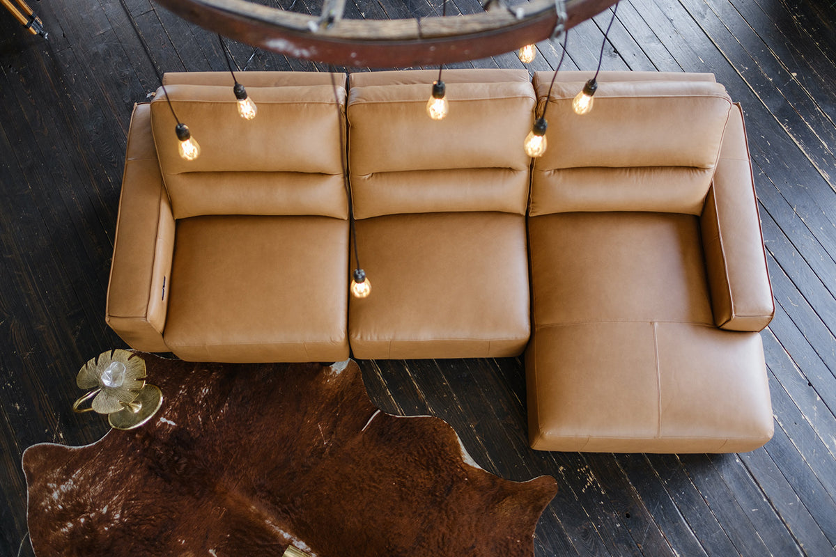 KAWOLA Big Sofa DORI motorischer Sitzvorzug Leder cognac