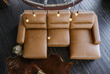 KAWOLA Big Sofa DORI motorischer Sitzvorzug Leder cognac
