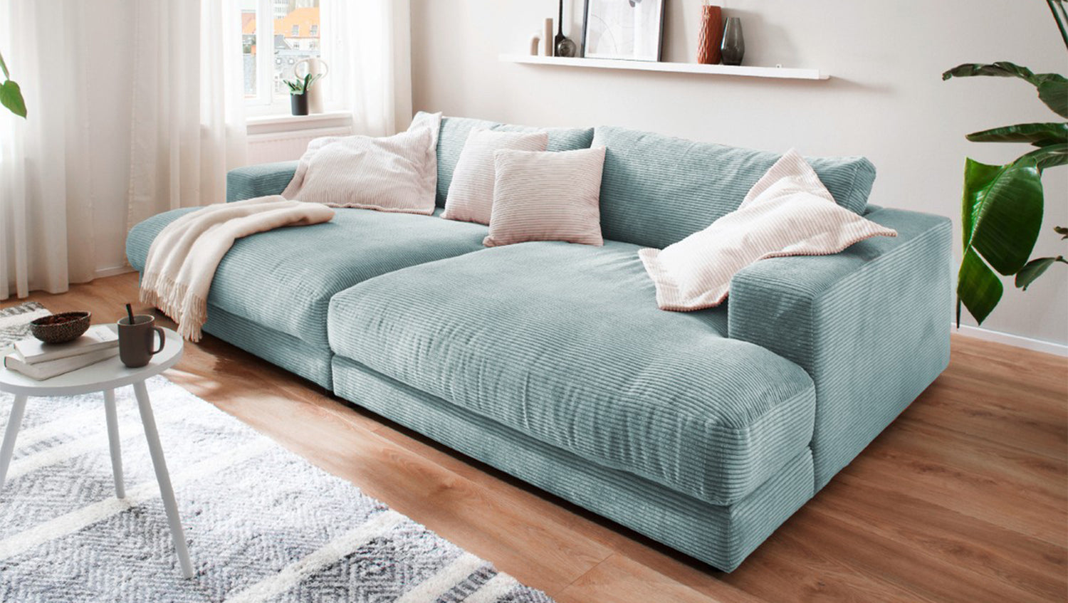KAWOLA Big Sofa MADELINE Cord hellblau, 290 x 190, ohne Holztablett