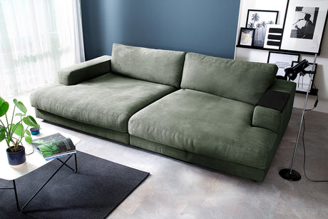 KAWOLA Big Sofa MADELINE Stoff olivgrün, 290 x 190, mit Holztablett schwarz