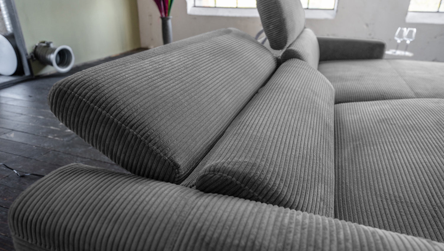 KAWOLA Sofa LAISKA Ecksofa Relaxfunktion teilmotorisch Cord grau