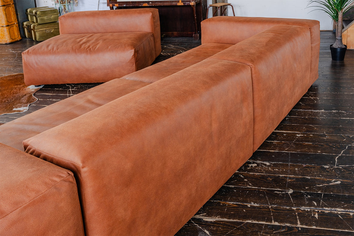 KAWOLA Sofa MIA Modulares Sofa 8-tlg. Lederfaserstoff cognac